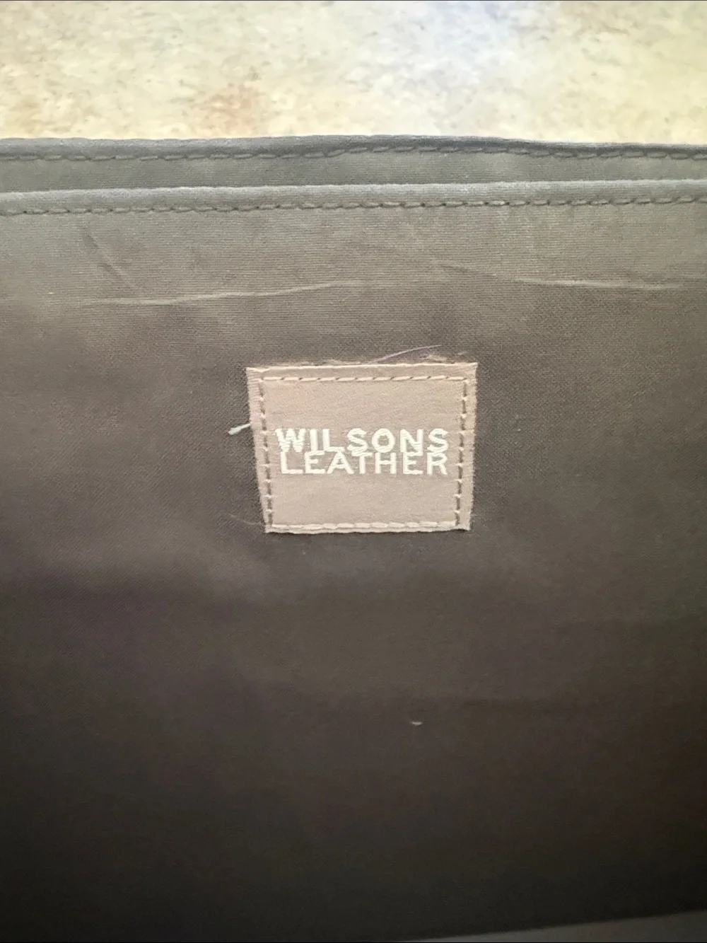 Wilsons Leather Black Leather Briefcase with Silver Hardware